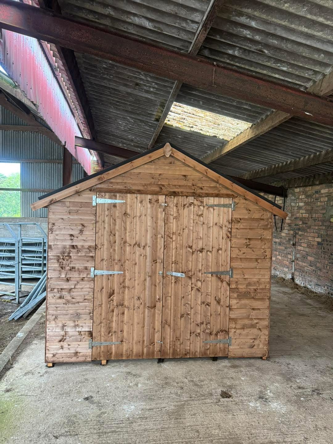 Hand built timber apex shed with double doors by Defender Sheds in Ayrshire