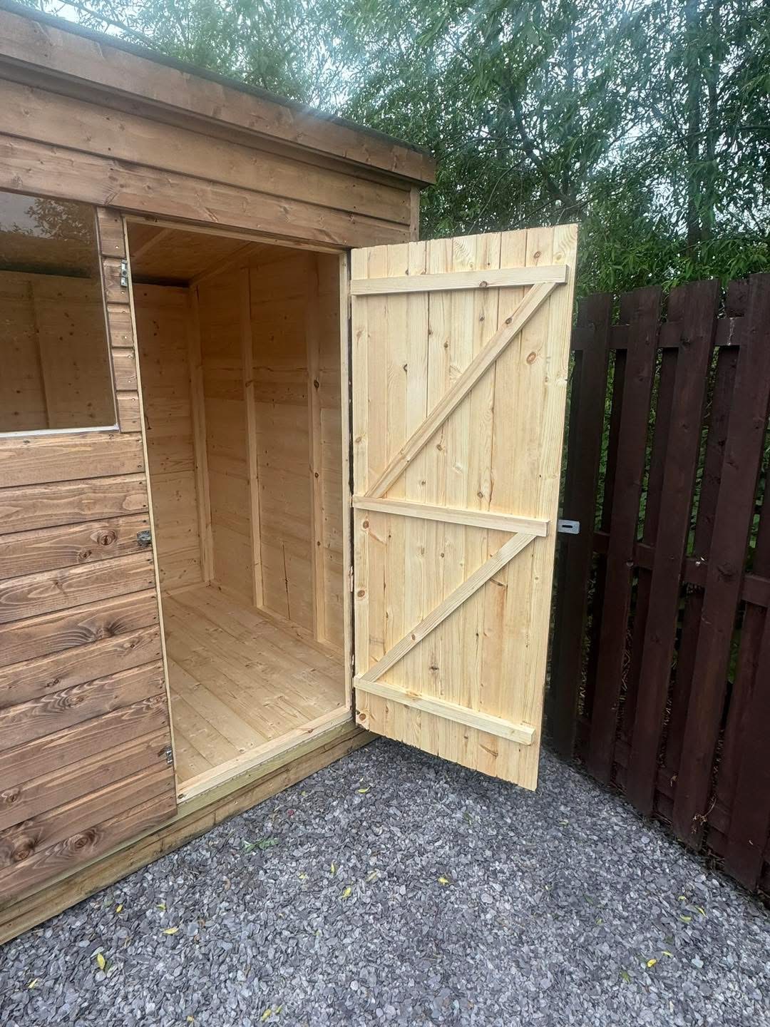 Braced timber shed door and tongue and groove interior detail